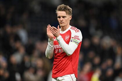 Martin Odegaard applauding Arsenal fans