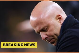 Liverpool manager Arne Slot looks on, plus