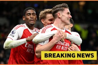 Martin Odegaard celebrates with his Arsenal teammates during the 4-1 win vs Tottenham