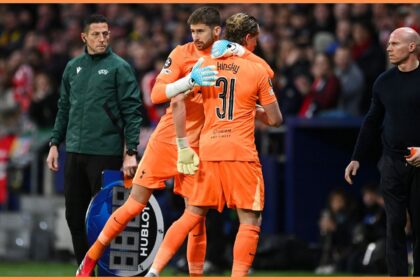 Guglielmo Vicario of Tottenham Hotspur embraces his teammate Antonin Kinsky