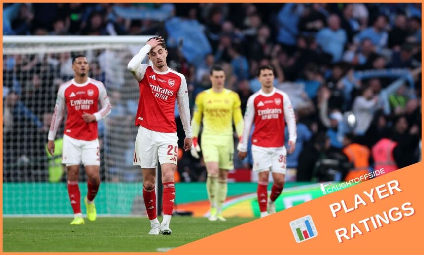Arsenal players react during the Carabao Cup final defeat against Manchester City