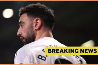 Bruno Fernandes looks on, and