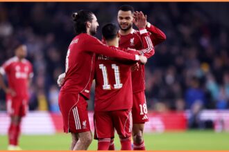 Cody Gakpo celebrates with Mohamed Salah and Dominik Szoboszlai