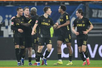 Said El Mala celebrates with his FC Koln teammates