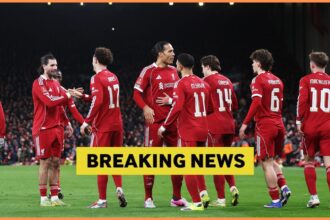 Curtis Jones celebrates with his Liverpool teammates