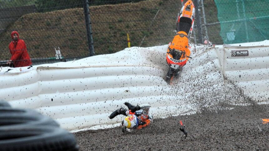 Dani Pedrosa crashes from the lead of a wet 2008 German MotoGP.