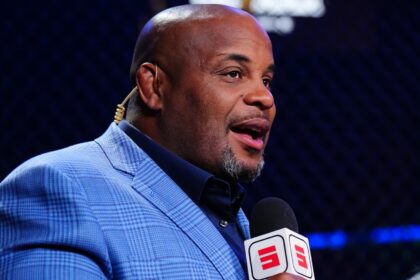 Daniel Cormier commentates cageside at UFC 321