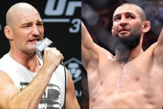 Sean Strickland speaks during the UFC 312 press conference, opposite Khamzat Chimaev celebrating his win at UFC 319