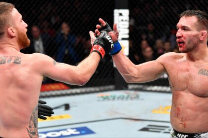 Justin Gaethje and Michael Chandler embrace after their fight at UFC 268