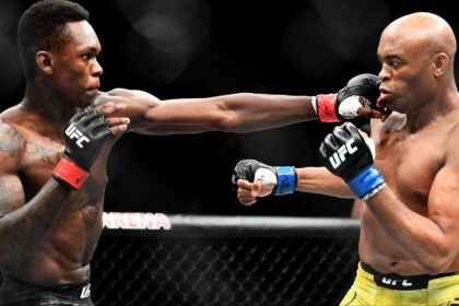 Israel Adesanya punches Anderson Silva at UFC 234