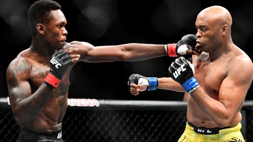Israel Adesanya punches Anderson Silva at UFC 234
