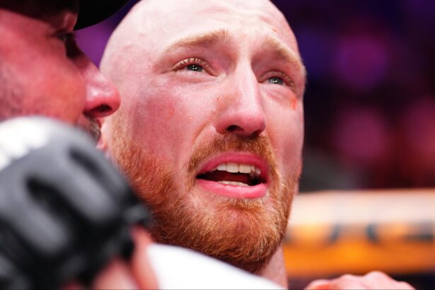 Joe Pyfer embraces his coach following a win at UFC Seattle