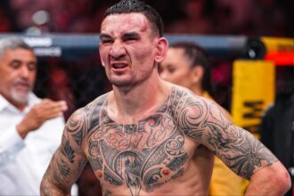 Max Holloway in the Octagon after UFC 326