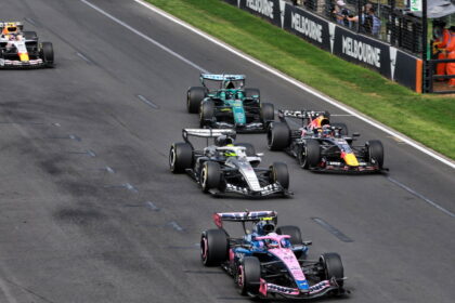 Colapinto just dodged a slow-moving Lawson at the start