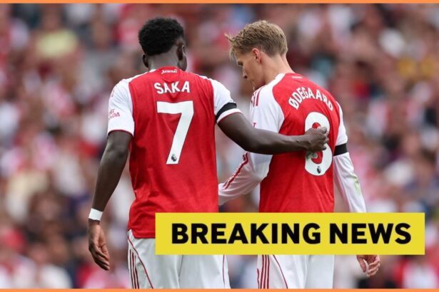 Bukayo Saka and Martin Odegaard of Arsenal