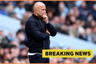 Arne Slot looks on, and