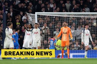 Guglielmo Vicario in action with overlay of Breaking News