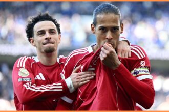 Curtis Jones and Virgil van Dijk celebrate as Liverpool beat Everton