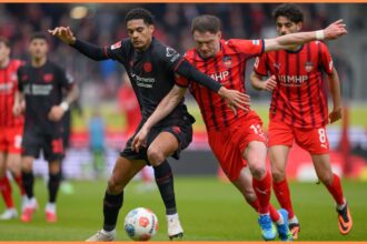 Jarrell Quansah in action for Bayer Leverkusen