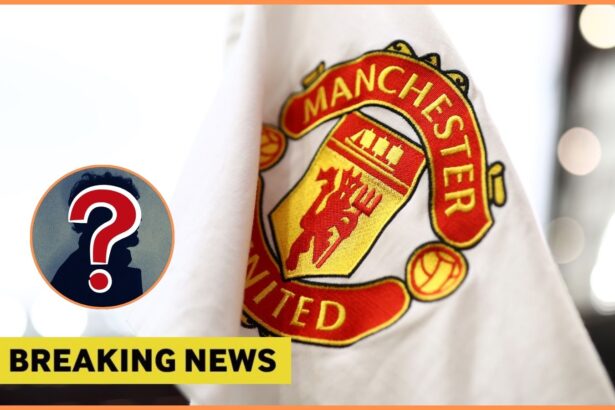 Manchester United logo on corner flag, and breaking news banner