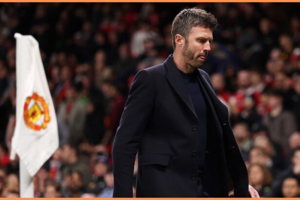 Michael Carrick walks down the tunnel after Man United