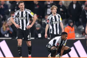 Anthony Gordon and his Newcastle teammates look on