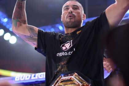 Carlos Ulberg celebrates after winning at UFC 327