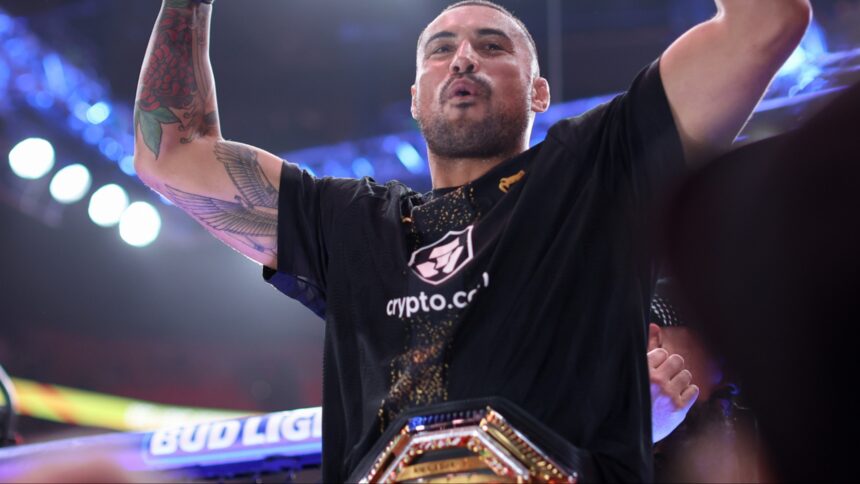 Carlos Ulberg celebrates after winning at UFC 327