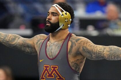 Gable Steveson celebrates a win at the NCAA Championships