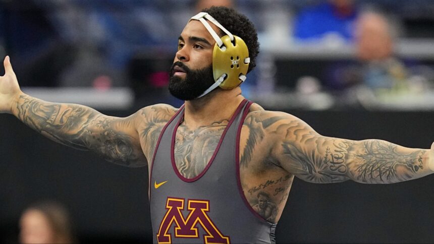 Gable Steveson celebrates a win at the NCAA Championships
