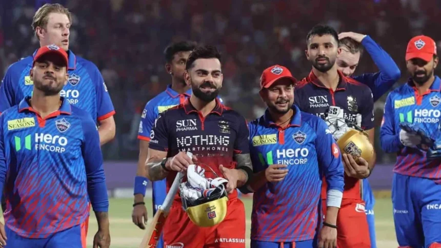 Delhi Capitals players with Virat Kohli