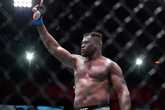 Francis Ngannou celebrates UFC victory