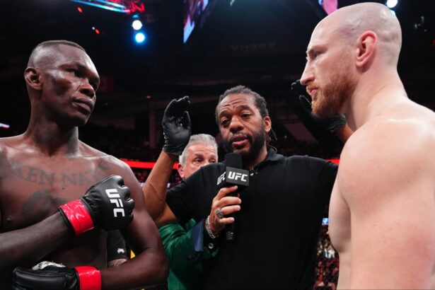 Israel Adesanya and Joe Pyfer face off