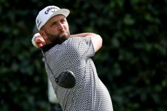 Jon Rahm defies LIV Golf uncertainty to lead in Mexico