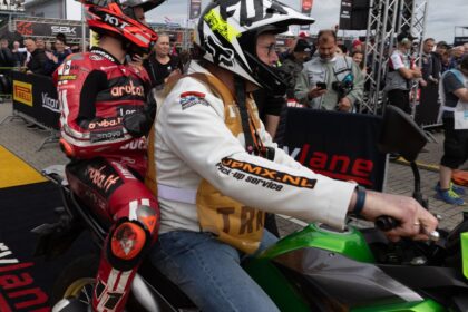 Nicolo Bulega arrives in parc ferme on a scooter after crashing in 2026 Dutch WorldSBK Superpole. Credit: Gold and Goose.