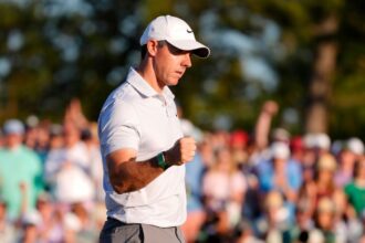 Rory McIlroy goes through 36 holes alone. Can someone catch him?