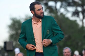 Scotty Scheffler arrives at the Masters with his 9-day-old son Remy