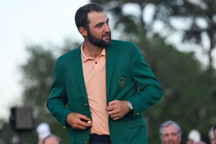 Scotty Scheffler arrives at the Masters with his 9-day-old son Remy