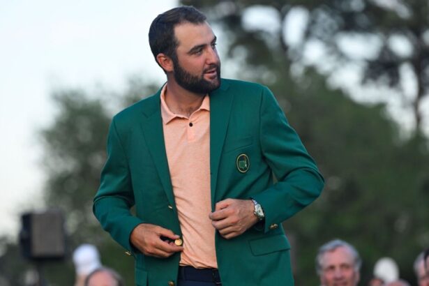 Scotty Scheffler arrives at the Masters with his 9-day-old son Remy