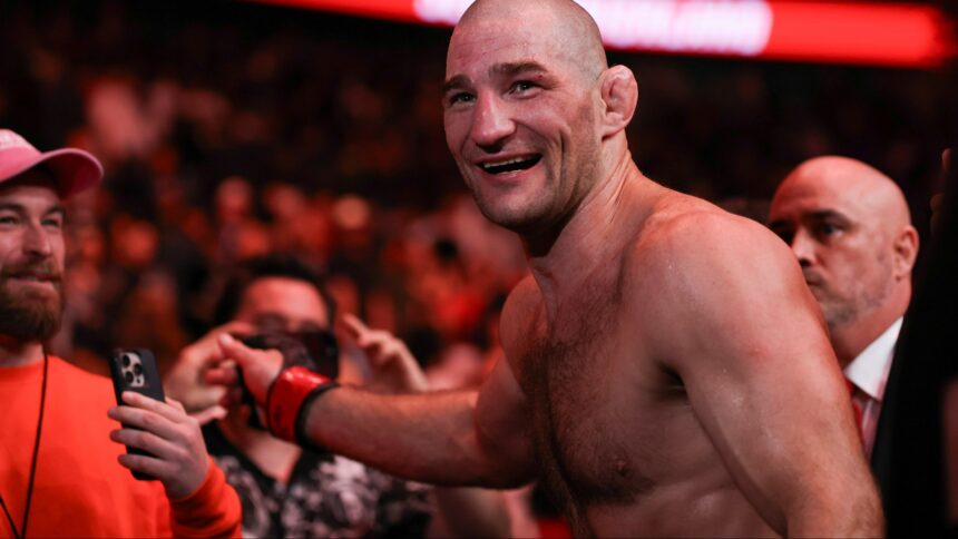 Sean Strickland celebrates with fans at UFC Houston