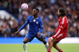 Moises Caicedo of Chelsea controls the ball